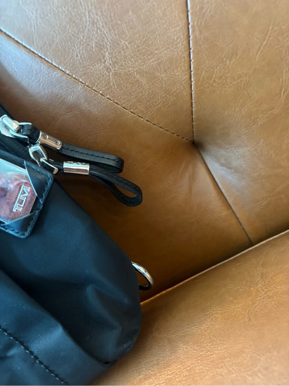 Tumi compact sling